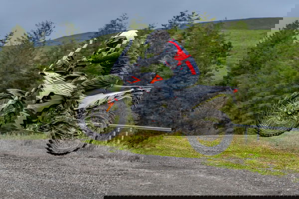 A 790 Adventure motorcycle jumping through the air